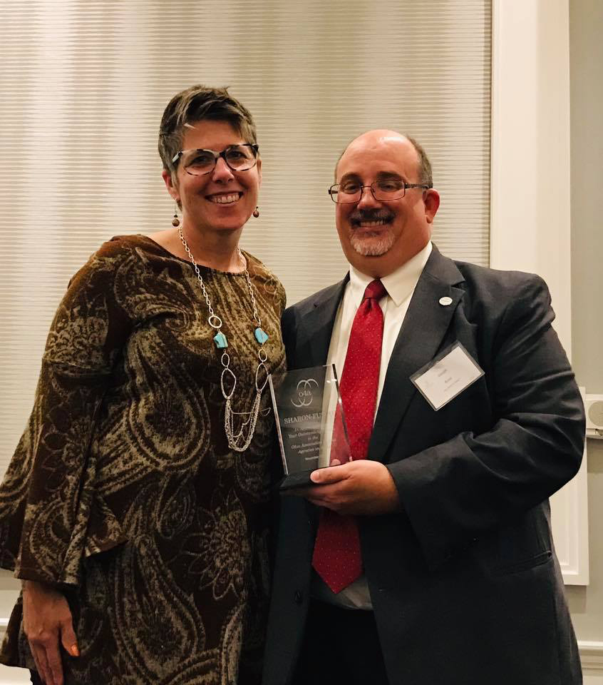 Sharon Fusco accepts AAA Staff Member of the Year Award