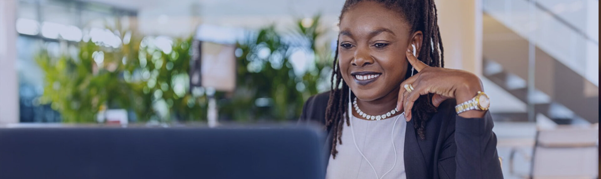 Woman taking a meeting from her laptop