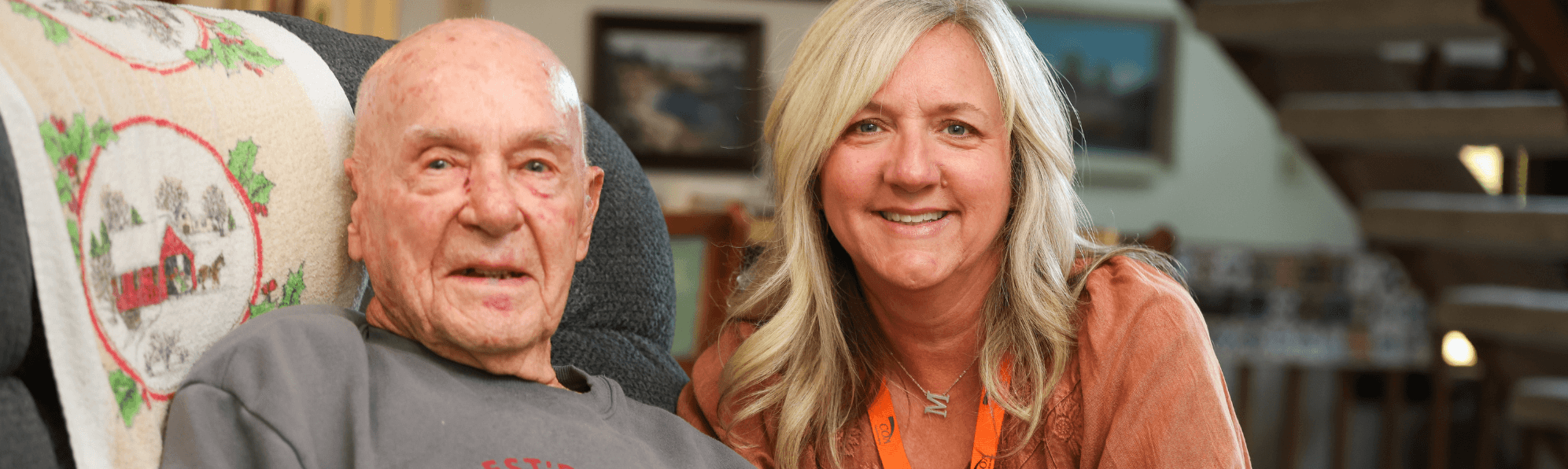 Volunteer with senior man