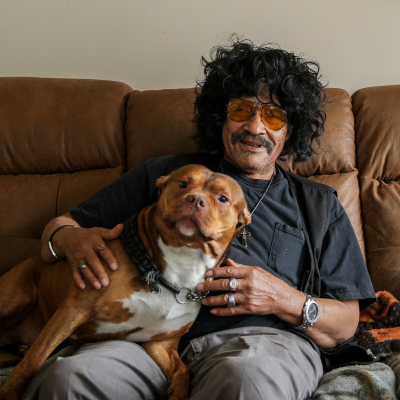 Man and dog in their home