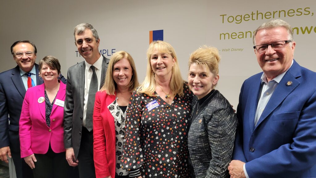 Legislators stand together