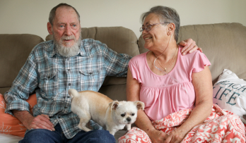 senior couple with their dog