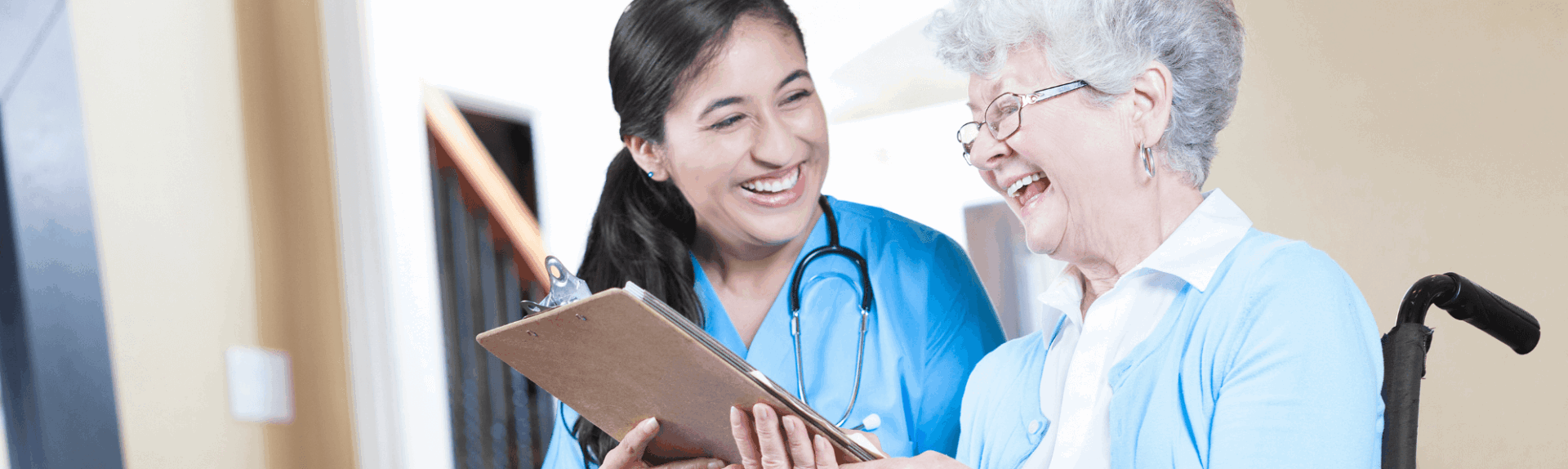 nurse showing chart to senior woman