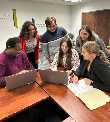 Emerging Professionals in a meeting